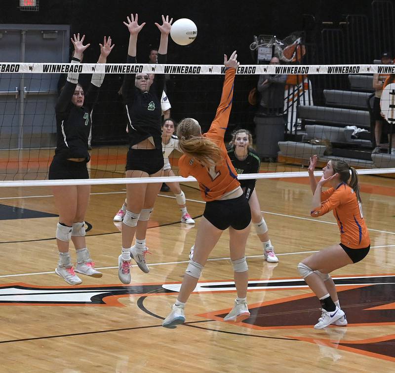 Rock Falls’ Denali  Stonitsch and Zoe Henson leap to block a shot by G-K’s Kailey Kline during the 2A sectional final on Wednesday Nov. 2, 2022.