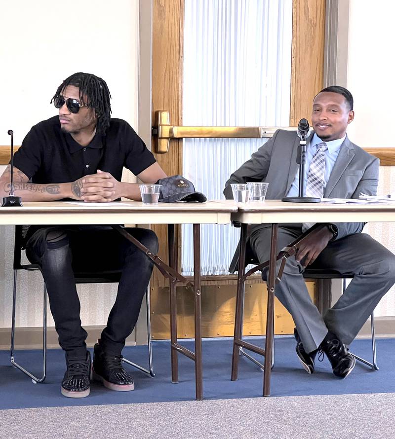 Diasee Scott, 24, left, sits next to, St. Anthony Lloyd, the director of leisure time activity at the Illinois Youth Center in St. Charles on Feb. 16, 2023. While Scott was incarcerated at the St. Charles facility he was mentored by Lloyd and benefited from Project Flex programing.