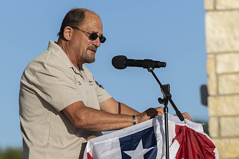 Doc Russo, manager of the Vietnam Traveling Memorial Wall, shares a story Friday, Sept. 1, 2023 about the impact the Wall has had on people.