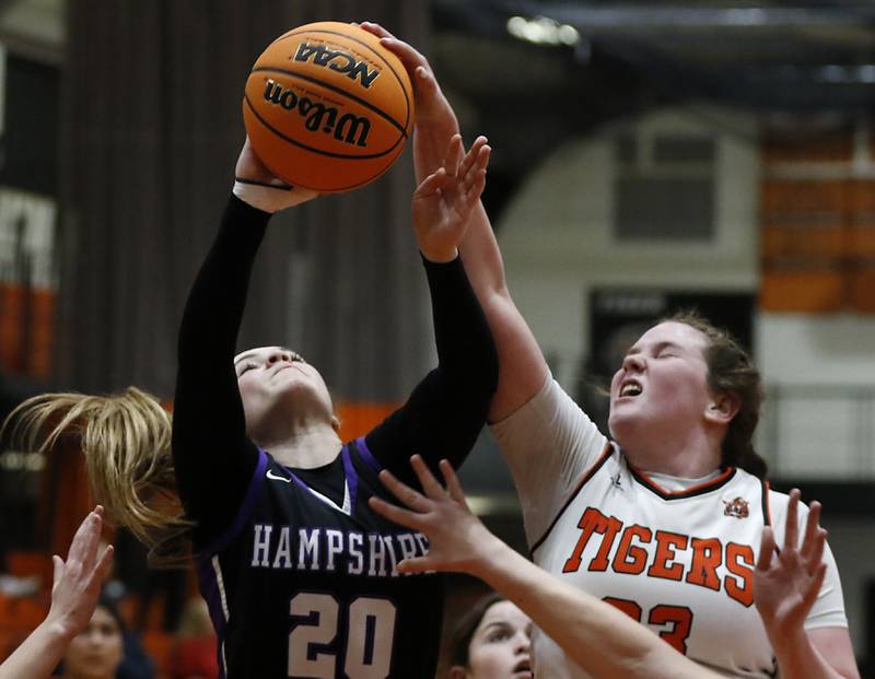 Crystal Lake Central's Leah Spychala (right) blocks the shot of Hampshire's Chloe Van Horn during a a Fox Valley Conference basketball game on Friday, Feb. 7, 2025, at Crystal Lake Central High School.
