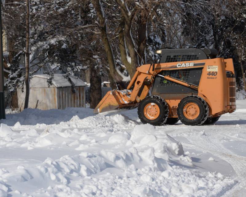 Forreston residents and business owners were busy Monday, Jan. 15, 2024 digging out from Friday and Saturday's winter storm that dropped an estimated 10-12 inches of snow across the region. Frigid temperatures followed the snow with nighttime lows hitting -14.
