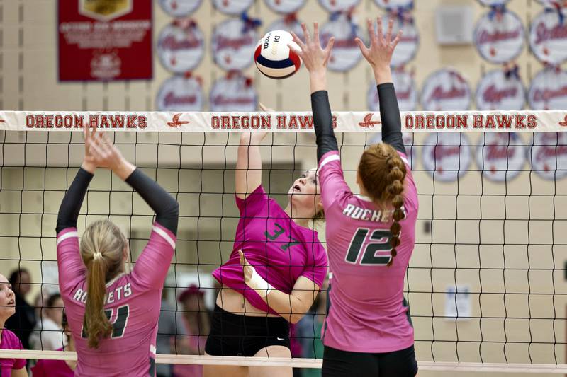 Oregon’s Liz Mois spikes the ball Tuesday, Oct. 11, 2022 against Rock Falls.
