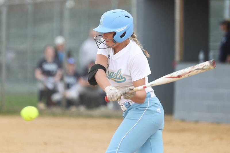 Joliet Catholic’s Sydney Walker locks in on a pitch against Plainfield South on Wednesday, April 10, 2024.