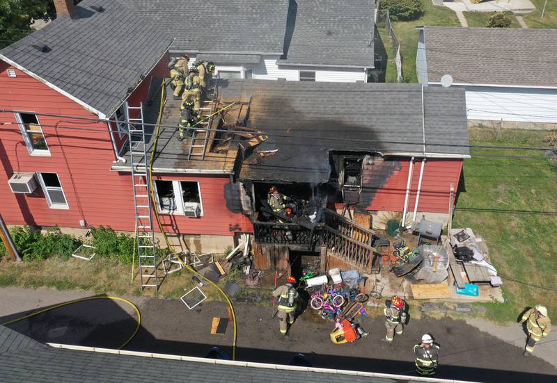 La Salle and Peru firefighters work the scene of a structure fire in the 300 block of Crosat Street on Thursday, Sept. 19, 2024 in La Salle. The fire happened shortly after 12:30p.m.