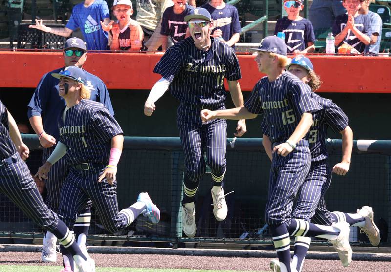 Lemont players celebrate their Class 3A state semifinal win over Highland Friday, June 7, 2024, at Duly Health and Care Field in Joliet.