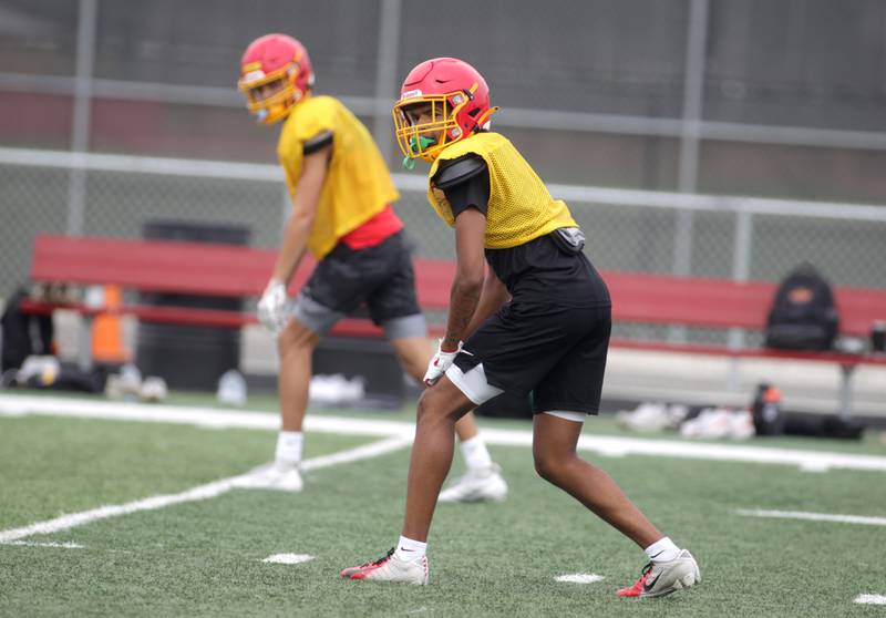 Batavia newcomer Isaiah Brown (right) lines up for a play during practice at the school on Thursday, Aug. 10, 2023.
