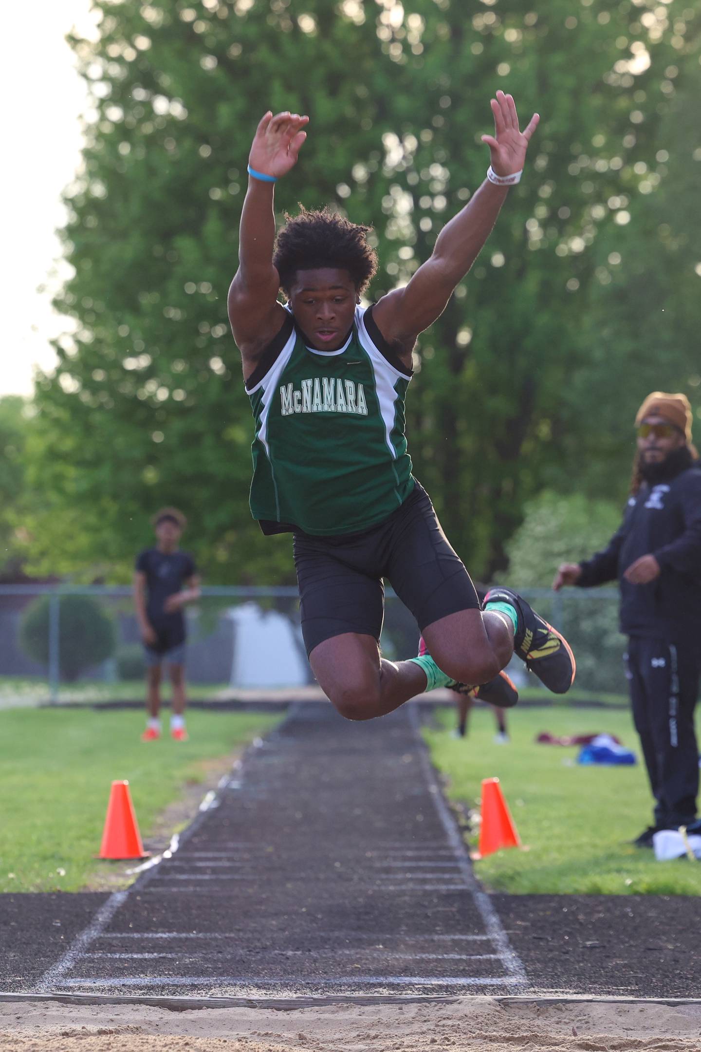 Bishop McNamara's Malachi Lee competes in the triple jump during the Manteno Track Invite on Friday, April 24, 2026.