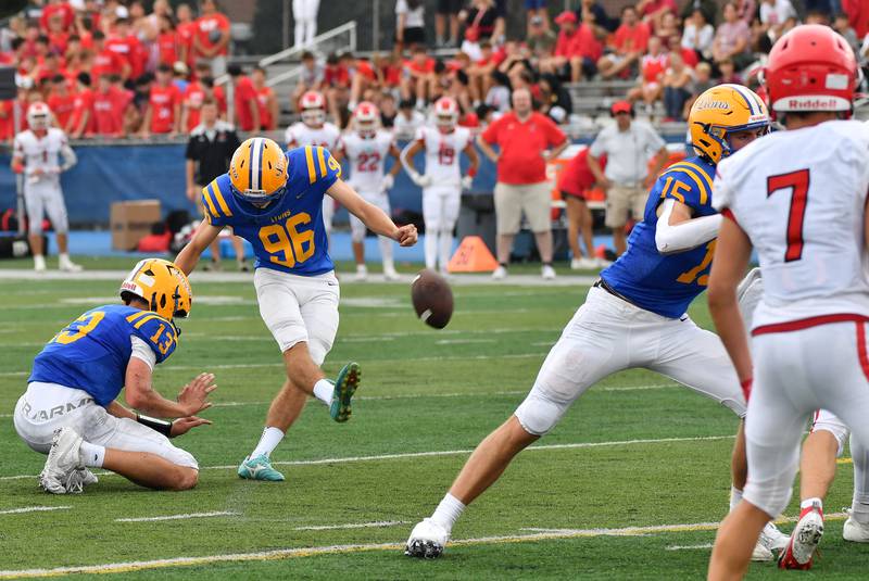 Lyons Township’s Ryland Avants (96) kicks a field goal at the end of the first half to give the Lions a three point halftime lead against Hinsdale Central on September 20, 2025 at Lyons Township High School in LaGrange.