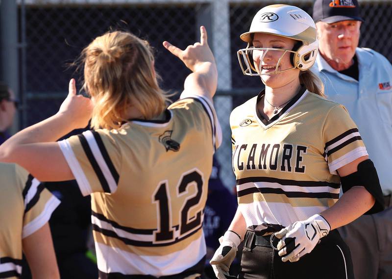 Sycamore's Ellison Hallahan trots home after her second home run of the game Monday, April 15, 2024, during their game against Rochelle at Rochelle High School.