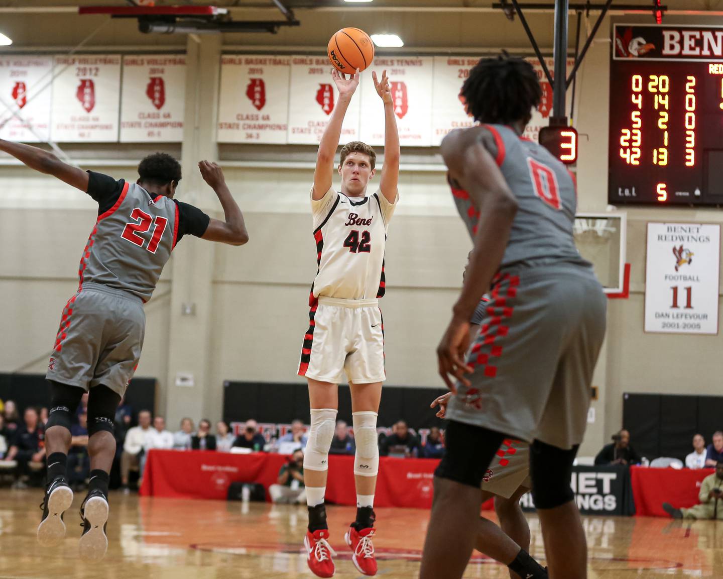 Benet's Colin Stack (42) shoots a jumper during their When Sides Collide Shootout basketball tournament matchup between Rich Township at Benet Academy. Jan 25, 2025 in Lisle.