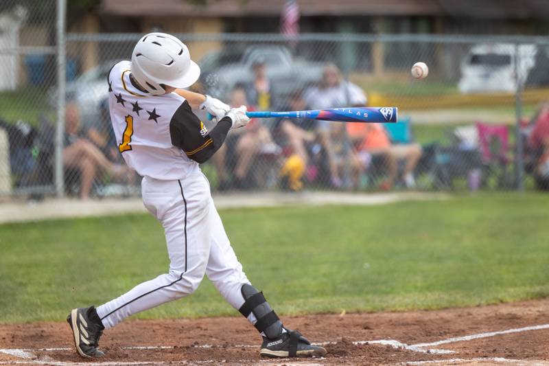 Chase Kaiser (1) of Iowa hits ball on Thursday, July 17, 2025 at Washington Park in Peru.
