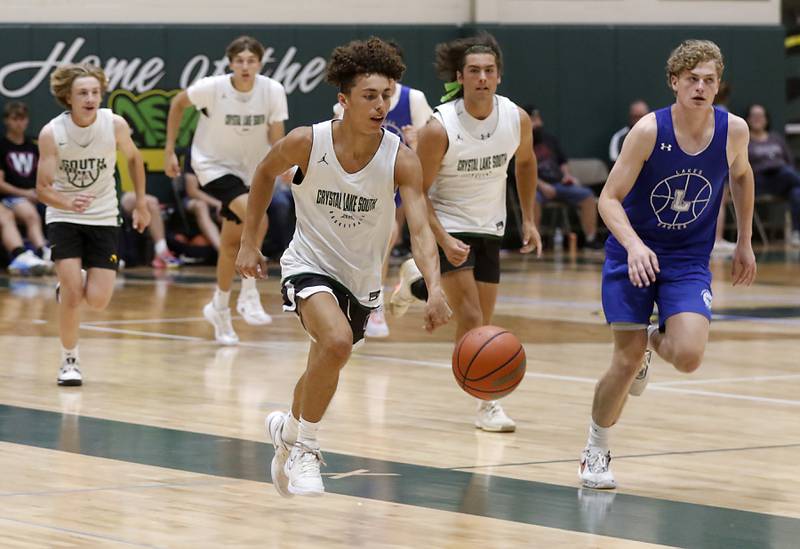 Crystal Lake South's AJ Demirov brings the ball up the court during a game against Lakes Friday, June 23, 2023, in the Crystal Lake South Gary Collins Shootout, at the high school in Crystal Lake.