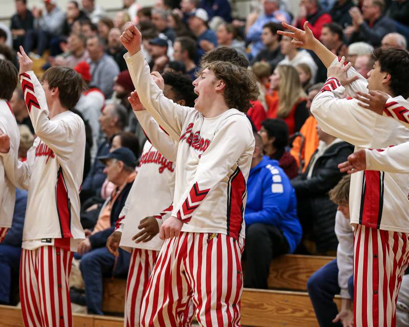 The Benet bench cheers on the team during their When Sides Collide Shootout basketball tournament matchup between Rich Township at Benet Academy. Jan 25, 2025 in Lisle.