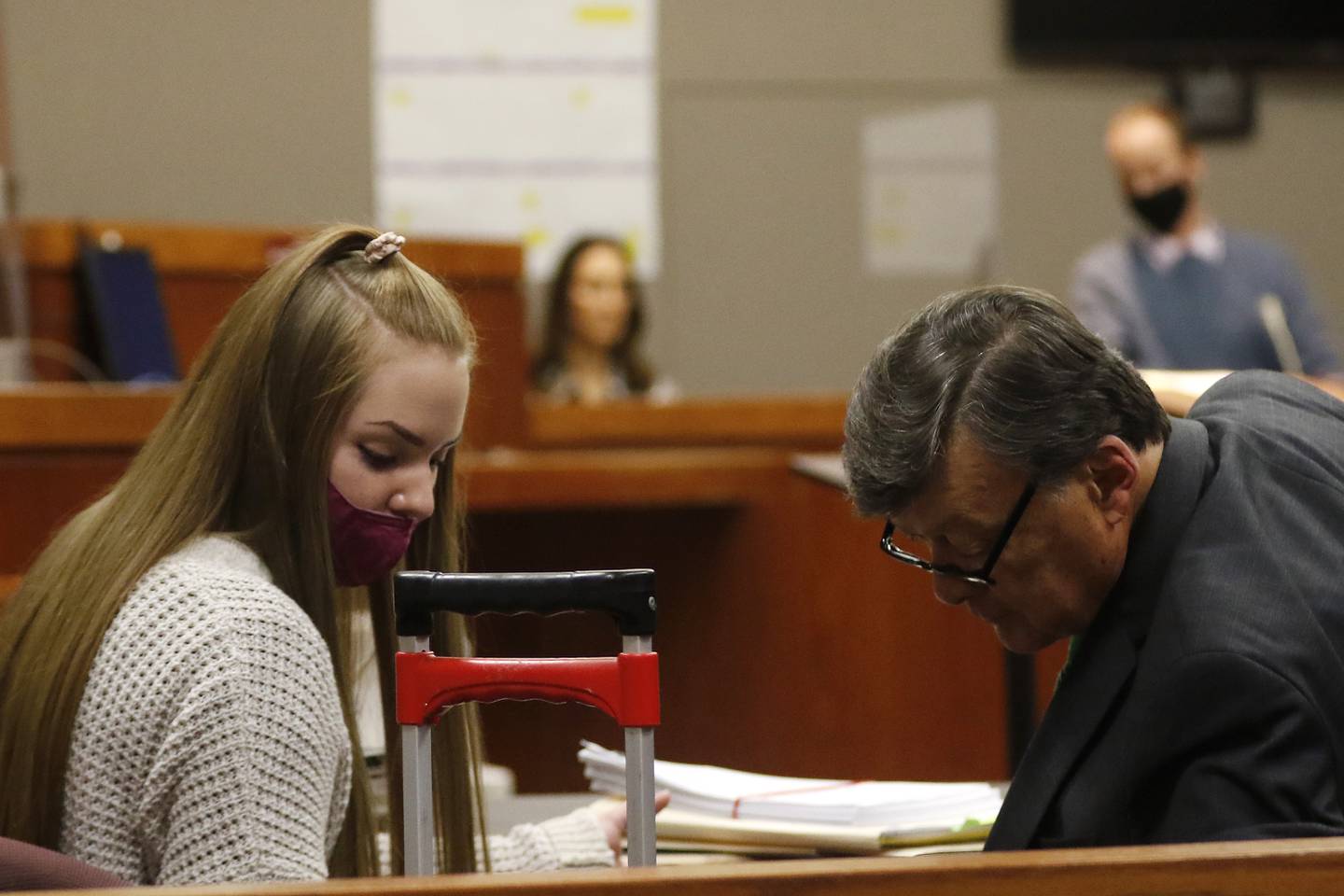 Veronica Kubiak, left, and attorney Ernest Blomquist are seen during trial Monday, Nov. 22, 2021, at the Michael J. Sullivan Judicial Center in Woodstock.