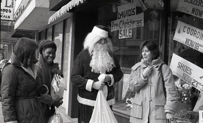 Shoppers stop to greet Santa Claus in 1981 while Christmas shopping in downtown DeKalb. (Photo courtesy of Joiner History Room and DeKalb County History Center)