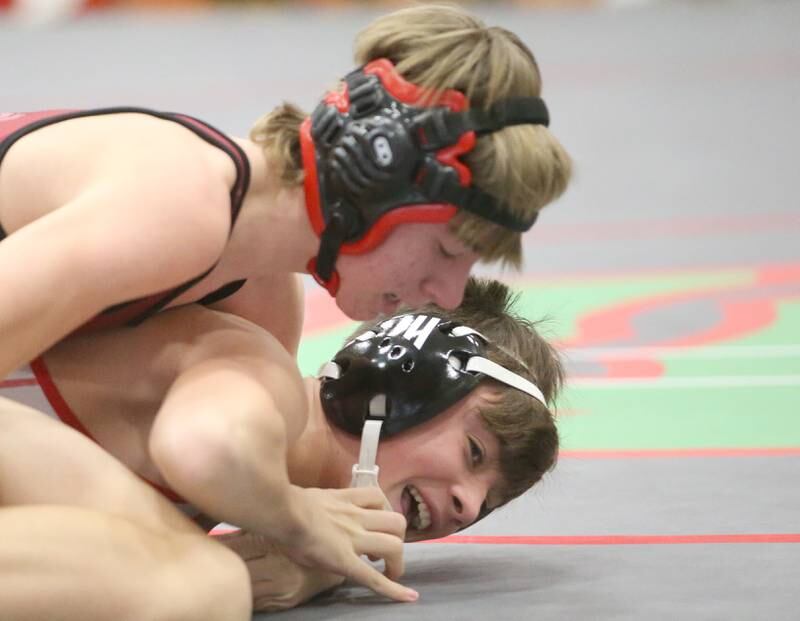 Streator's Ted Neuman wrestles L-P's Charlie Clifford during a meet on Wednesday, Dec. 13, 2023 in Sellett Gymnasium at L-P High School.