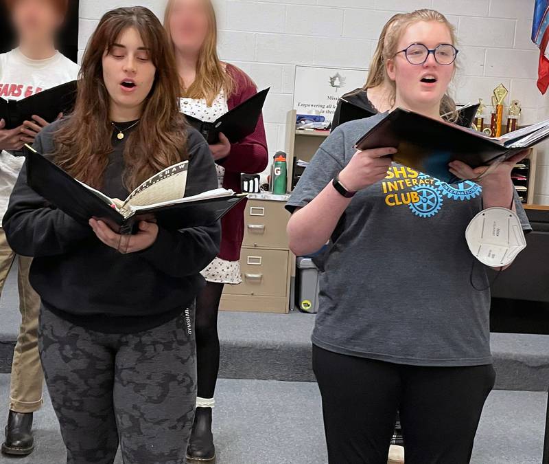 (Left to right); Cassandra Chamoun and Lili Jennings, rehearse for the ACDA National Honors Choir's biennial conference.