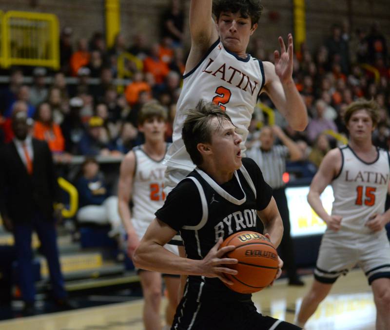 Byron's Ryan Tucker (10) drives the baseline in first quarter action against Chicago Latin at the 2A Supersectional in Sterling on Monday, March 4, 2024. The Tigers beat the Romans 85-71 to advance to the state finals this week in Champaign.