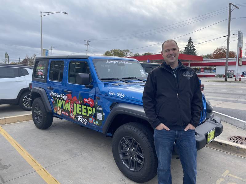 Mike Missak, president of Jeeps on the Run, stands near the new Jeep Wrangler donated by Ray Chrysler Dodge Jeep Ram to benefit this year’s JOTR Toys for Tots Run. The Wrangler is being raffled, with the winner’s name to be drawn Dec. 3 at the Toys for Tots Run after-party in Lincolnshire. Details and tickets are available at jeepsontherun.com.