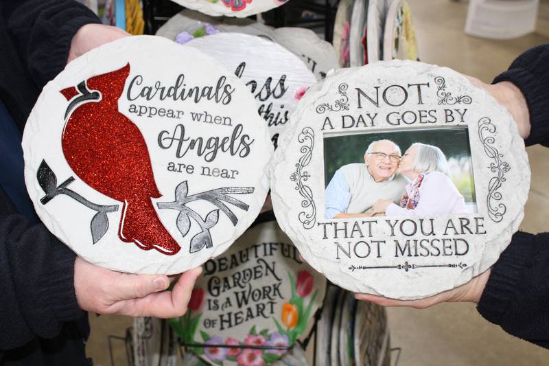 These decorative stones, sold at Sullivan's Foods in Mendota, can brighten a garden area.