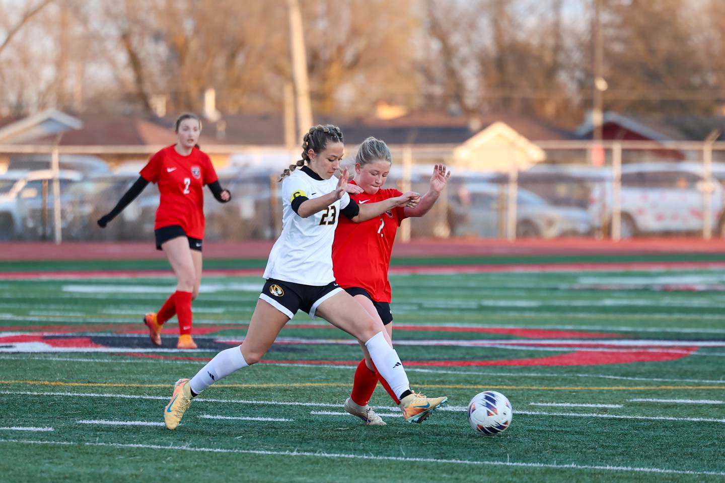 Herscher's Sophie Venckauskas and Bradley-Bourbonnais' Brynna Dykstra compete for possession during Bradley-Bourbonnais' 4-3 victory on Monday, April 6, 2026.