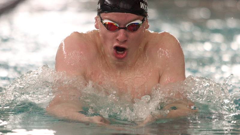 Drew Watson of Cary-Grove co-op swims the 200-Yard Individual Medley during the Fox Valley Conference Swimming Championships at Woodstock North High School Saturday.