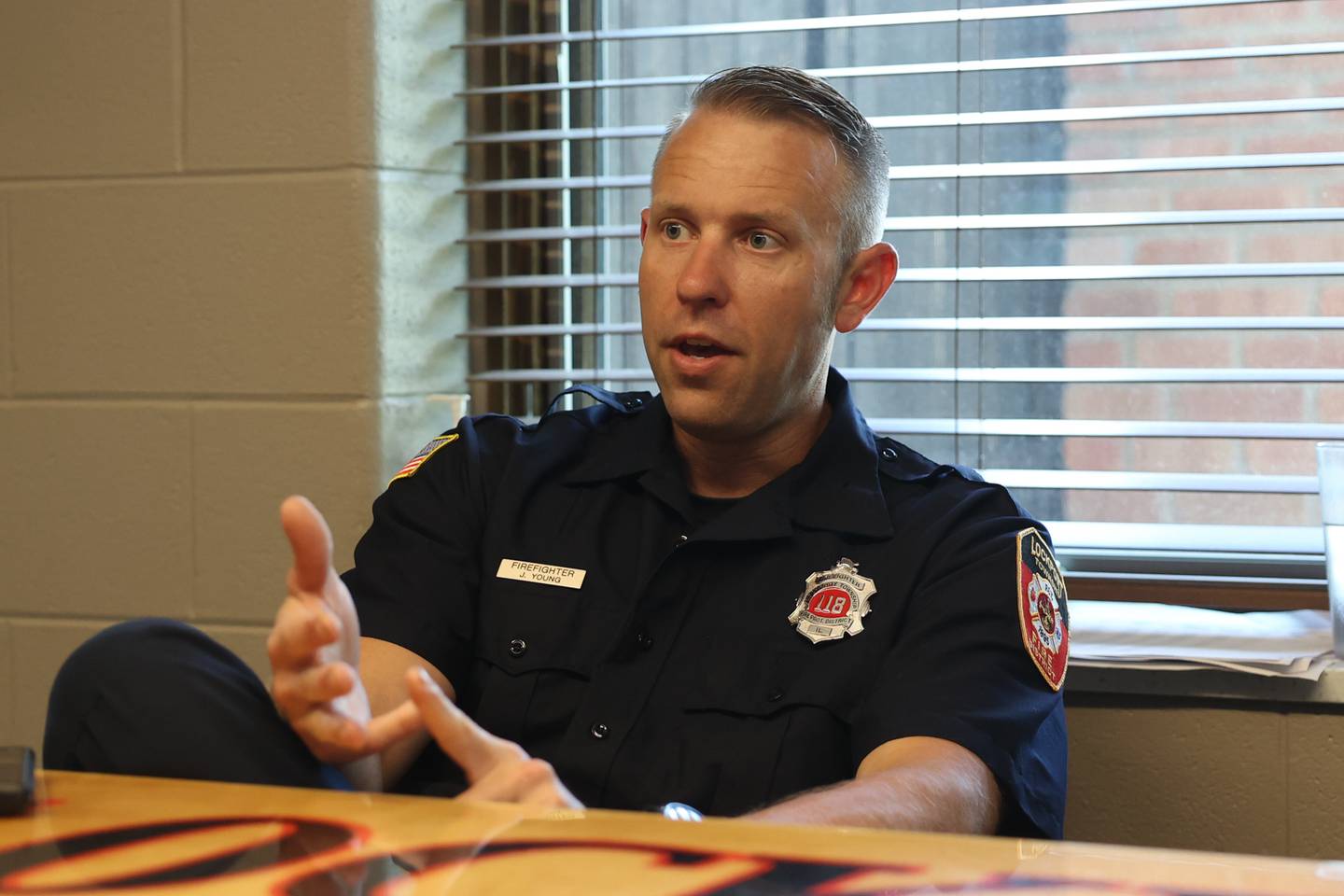 Lockport Firefighter Paramedic Jeff Young goes through the signs they look for before administering Narcan to an unresponsive person when arriving to a call. Wednesday, July 6, 2022 in Lockport.
