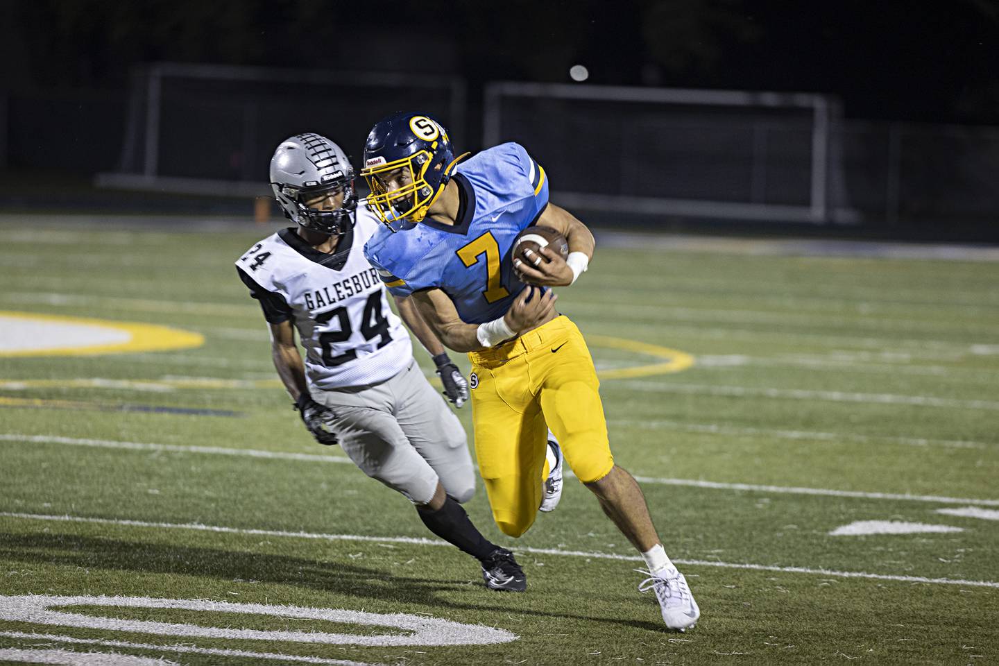 Sterling’s Andre Klaver hauls in a catch in front of  Galesburg’s Jamar Range Thursday, Sept. 14, 2023 at Sterling High School.