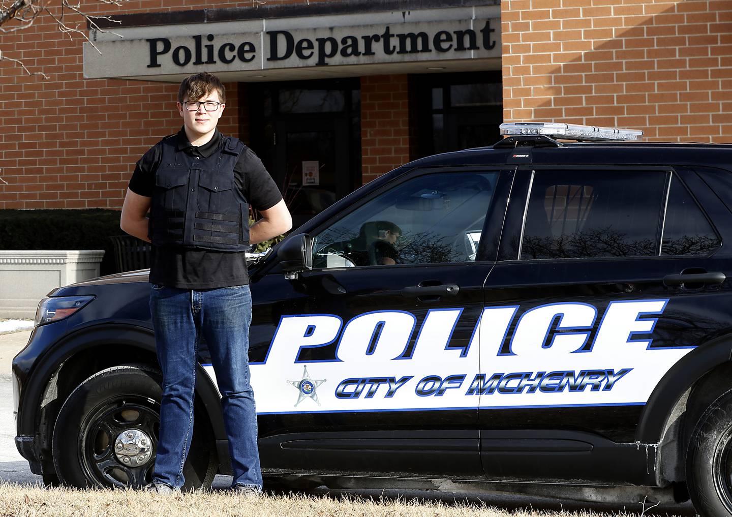 Drake Rueckemann, 18, prepares to start a ride-along with the McHenry Police Department on Monday, Feb 14, 2022. Rueckemann, who is a senior at McHenry High School, is taking part in an internship program as part of the school’s new social science class.