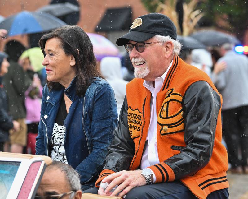 Crystal Lake Central H.S. honorary Grand Marshall "Mr. Naughton" as seen during the school's 100 year anniversary homecoming day parade in downtown Crystal Lake on a rainy Saturday, Sep. 16, 2023 in Crystal Lake. The parade began at the high school and made its way through downtown Crystal Lake.