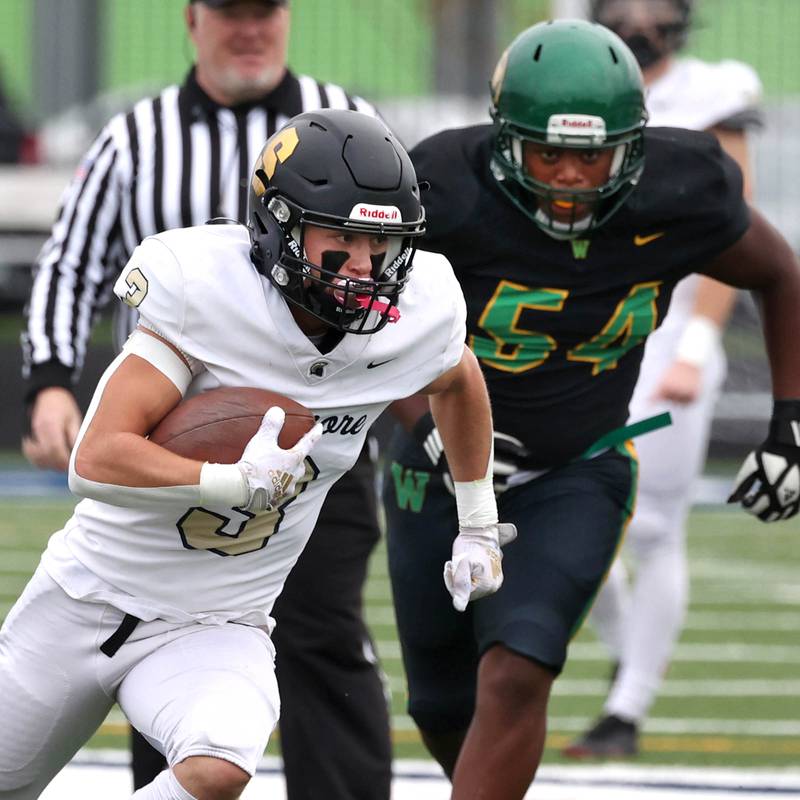 Sycamore's Carter York is on his way through the Westinghouse defense for a touchdown Saturday, Nov. 9, 2024 during their Class 5A second-round playoff game at Knute Rockne Stadium in Chicago.