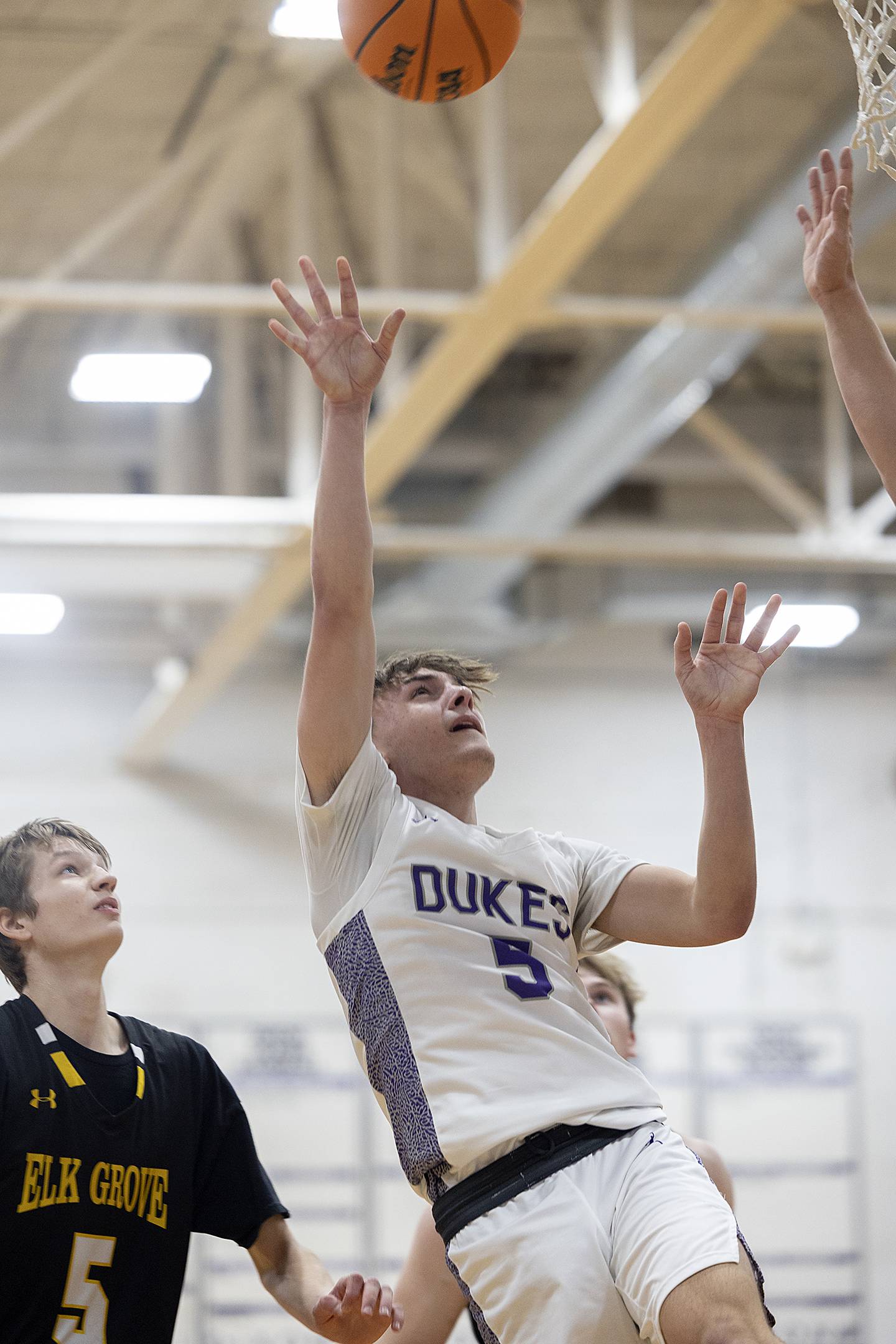 Dixon’s Brady Feit puts up a shot against Elk Grove Saturday, Jan. 11, 2025, at Dixon High School.
