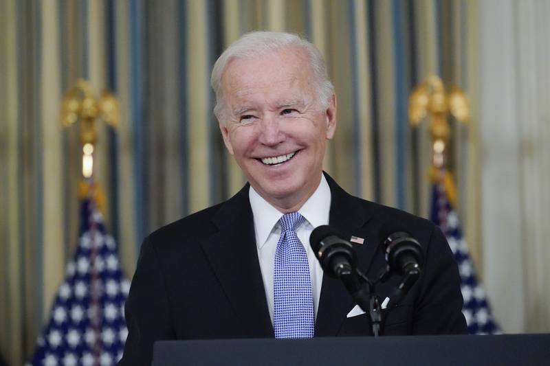 FILE - President Joe Biden speaks about the bipartisan infrastructure bill in the State Dinning Room of the White House, Nov. 6, 2021, in Washington. The $1 trillion infrastructure bill that President Joe Biden signs into law on Monday, Nov. 15, represents a historic achievement at a time of deeply fractured politics. But the compromises needed to bridge the political divide suggest that the spending might not be as transformative as Biden has promised for the U.S. economy. (AP Photo/Alex Brandon, File)