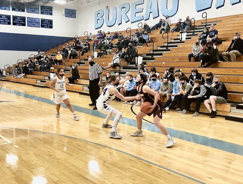 Bureau Valley senior Kyra Stoller puts the pressure on Annawan's Bella VanOpDorp in the second half Thursday night at the Storm Cellar.