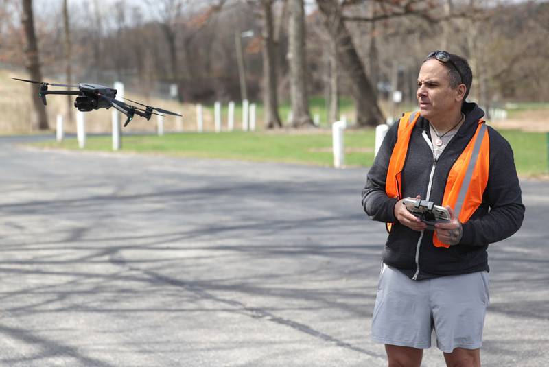 Anthony Tortoriello, of DeKalb, flies his drone Monday, April 6, 2026, at Hopkins Park in DeKalb.