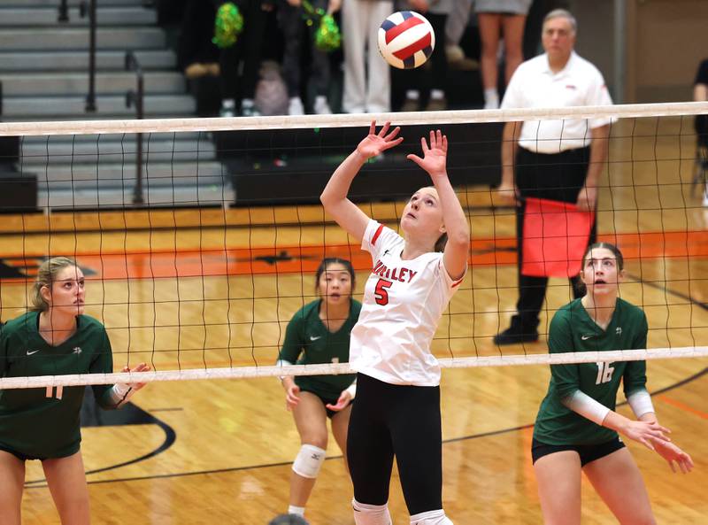 Huntley's Emily Ernst sets the ball Monday, Nov. 11, 2024, during their Class 4A supersectional match against Fremd at DeKalb High School.