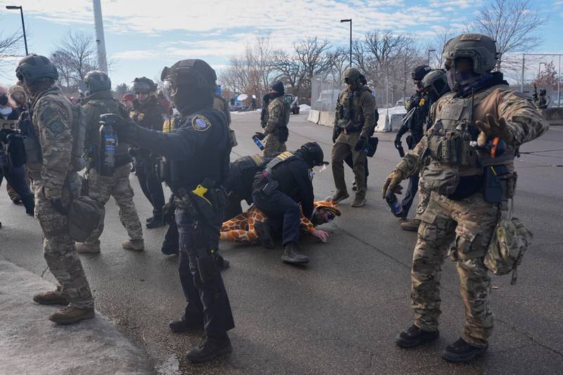 Protesters demonstrate against Immigration and Customs Enforcement (ICE) after Renee Good, who was fatally shot by an ICE officer last week, Monday, Jan. 12, 2026, in Minneapolis. (AP Photo/Jen Golbeck)