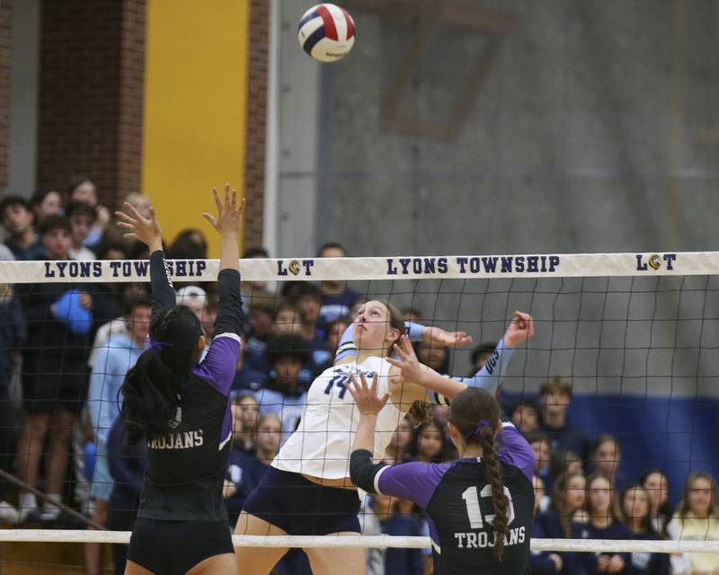 Downers Grove South's Jennifer Curran (14) lines up a kill shot during Class 4A Lyons Sectional Semifinal volleyball match between Downers Grove South at Downers Grove North. Nov 4, 2025 in La Grange.