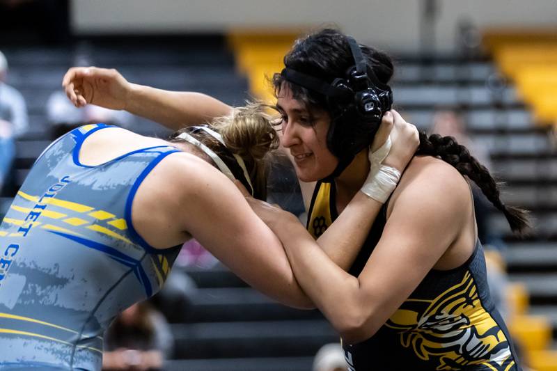 Joliet Central’s Kiara Schneider and Joliet West’s Jennifer Escobido compete in the 170 pound match at Joliet West on Jan. 12, 2026.