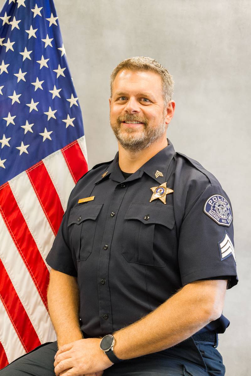 Batavia Police Department Sargent Chris Potthoff wins the 2023 Carl Dobbs Memorial Scholarship Award.