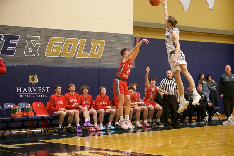 Serena's Carson Baker goes to block the shot of Aurora Christian's Jacob Baumann at the Class 1A Boy's Basketball  Super Sectional on Friday , March 1, 2024 at Harvest Christian Academy  in Elgin.