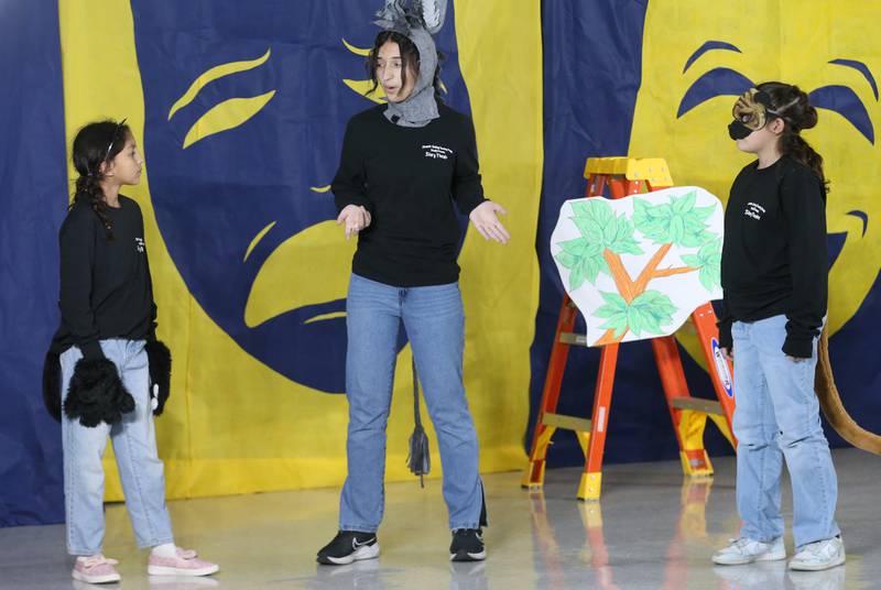 Sofia Robles, Savannah Guzman and Elena Villalobos act out a scene during a rehearsal of "Once Upon A Time" on Tuesday, Nov. 12, 2024 at Marquette Grade School. The production is a story theatre featuring a collection of stories written from the stories in the collection of the Grimm Brothers and Aesop's Fables.