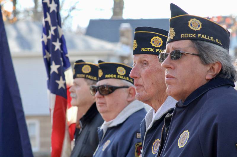 An honor guard stands at attention on Friday, Nov. 11, 2022, at Veterans Memorial Park in Rock Falls.