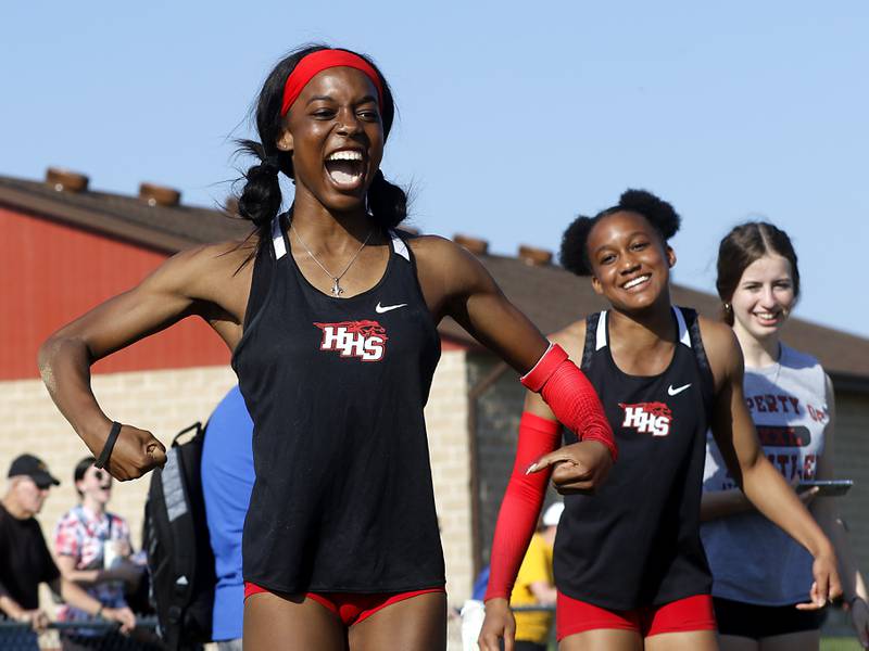 Huntley's Alexandria Johnson celebrates her personal best long jump Friday, May 10, 2023, during the IHSA Class 3A Huntley Girls Track and Field Sectional at Huntley High School.