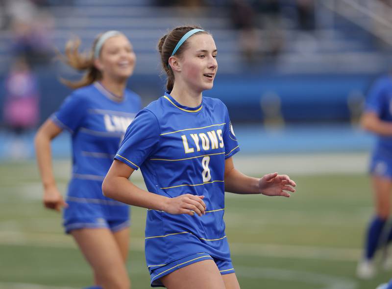 Lyons Township's Carolina Capizzi (8) celebrates her goal during the girl's varsity soccer match between Lyons Township and Wheaton Warrenville South high schools on Thursday, March 27, 2025 in Western Springs.