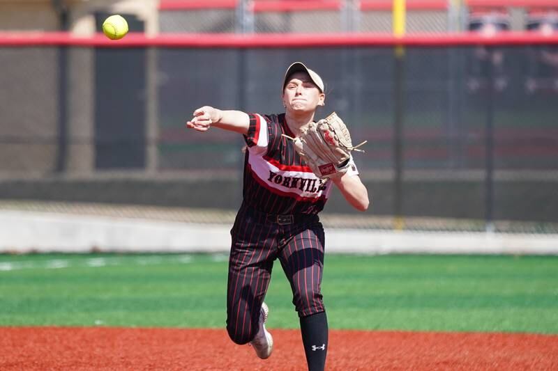 Yorkville's Bella Phillips fields a grounder and throws to first for an out against Antioch during a nonconference softball game at Yorkville High School on Saturday, April 12, 2025.