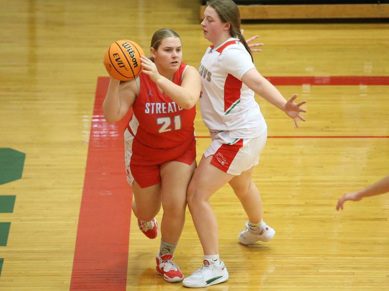Streator's Maddie Wahl dribbles baseline as L-P's Madilyn Knowles defends on Tuesday, Jan. 28, 2025 in Sellett Gymnasium at L-P High School.