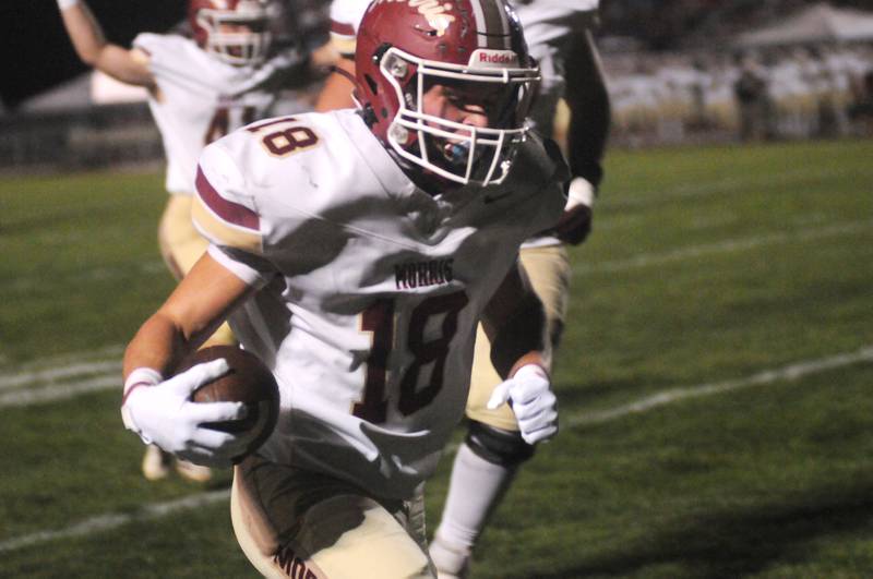 Morris' Logan Conroy runs in the first touchdown against Ottawa on Friday, Oct. 10, 2025 at King Field in Ottawa.