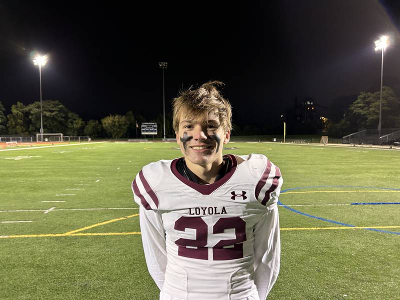 Loyola's JT Kurtzweil intercepted a pass and returned it for a touchdown in Loyola's 47-0 win over IC Catholic on Friday in Elmhurst.