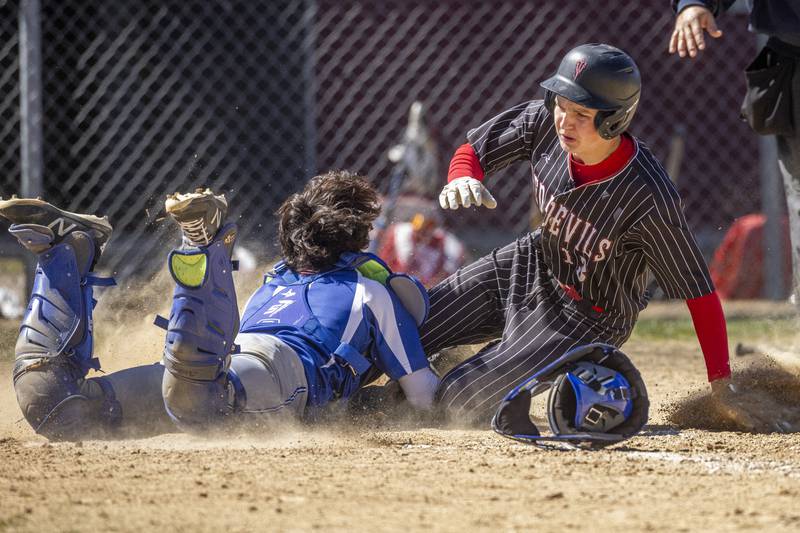 Hall's Jack Jablonski collides with Princeton's Catcher, Nolan Kloepping during the second game of a double header on April 6, 2024 at Foley Field. Jablunski would be called safe leading to the only run scored from either team in the next five consecutive innings.